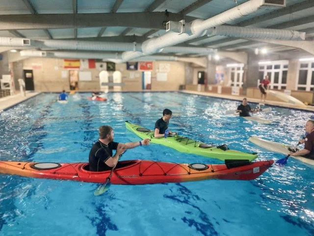 Kayaking (1) Several people practice kayaking