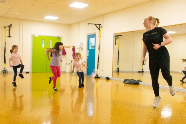 Kids Dance-3 Children and an instructor take part in a kids dance class
